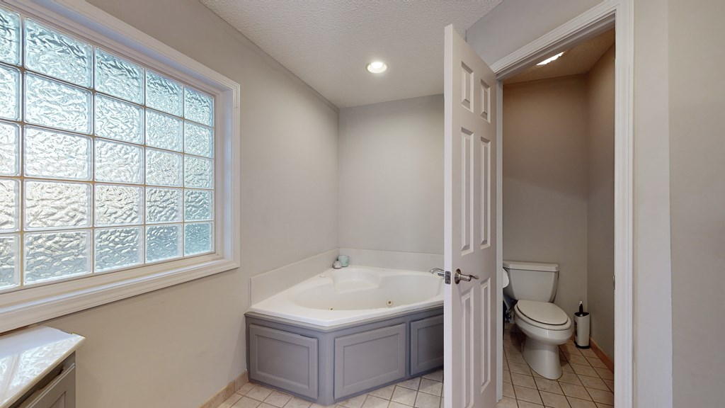 Master Jetted Tub & Toilet Room
